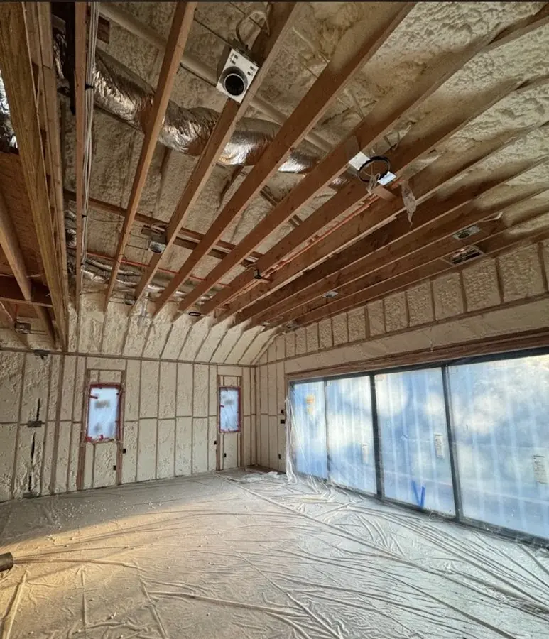 Interior walls and ceiling insulated with spray foam during new construction in Lake Butler